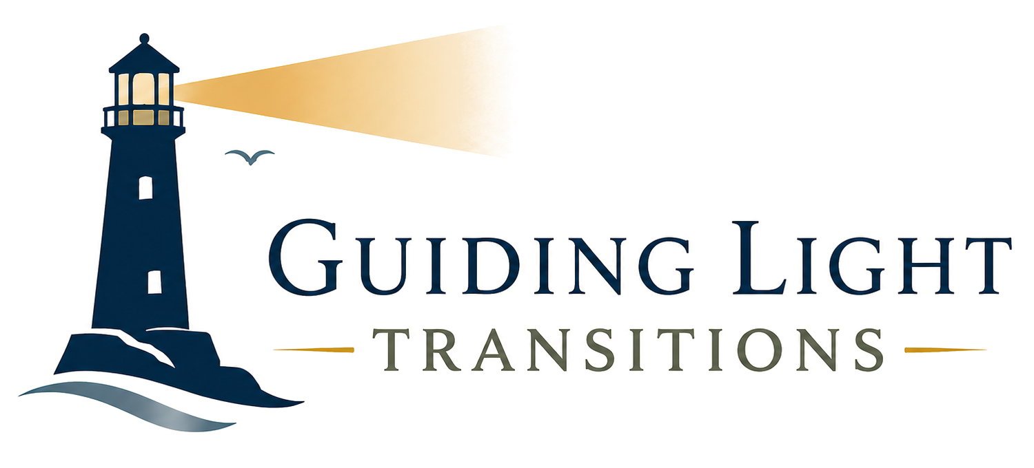 Guiding Light Transitions logo: a navy lighthouse with a golden beam over a coastline